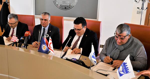COLLECTIVE LABOUR AGREEMENT BETWEEN EMU ADMINISTRATION AND DAU-SEN
